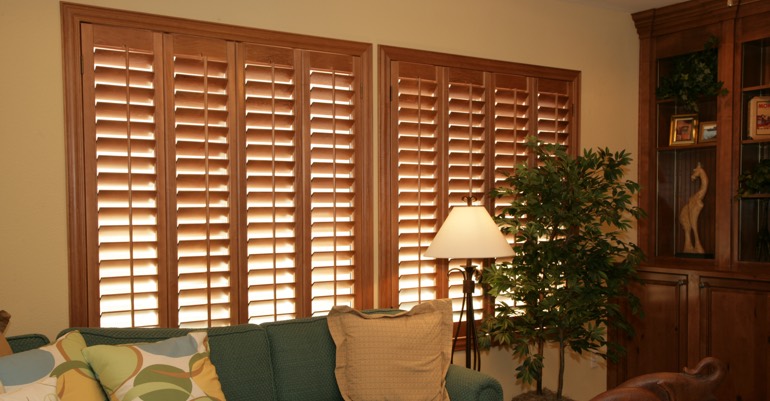 Natural wood shutters in Atlanta living room.